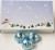 Scott's Cakes Dark Chocolate Vivid Orange Bon-Bon Filling Candies with Light Blue Foils in a 1 Pound Winter Wonderland Box