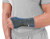 Mueller 4-Way Stretch Premium Knit Wrist Support with Thermo Reactive Technology Large-Extra Large Black