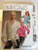 McCall's M5323 Sewing Pattern, Misses' Wrap Blouses and Sash, Size EE -14-16-18-20-