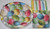 Easter Paper Plates - Bright Egg Design Dinner and Napkin Party Pack - Serves 50 - Includes 50 (10" x 12") Oval Dinner Plates, 100 (13" X 13") Double Sided Napkins with cardboard Napkin holders