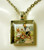 Rabbits with a wheel barrel pendant with chain - WAP28-006