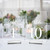 JINMURY Wedding Table Numbers 1-15 with Stands, 5x7 Inch Clear Acrylic Table Numbers Printed Calligraphy Font, Acrylic Sign Wedding Table Numbers with Holder for Wedding Party Reception