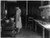HistoricalFindings Photo: Farm Woman Cooking at Stove in Kitchen, 1925-1930