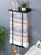 PHOJEWI Towel Rack Wall Mounted, Black Towel Racks for Bathroom Wall Hanging Towel Rack with Shelf Vertical Towel Rack for Rolled Towels RV Towel Holder for Bathroom Towel Storage Rack
