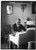 HistoricalFindings Photo: F. Lowden,desks,fireplaces,Chairs,interiors,Rooms,Men,Portrait,Bain News Service
