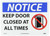 NMC N291AB NOTICE - KEEP DOOR CLOSED AT ALL TIMES -14 in. x 10 in. Aluminum Notice Sign with Graphic, White/Black Text on Blue/White Base