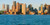 Panoramic of Boston Harbor and the Boston skyline at sunrise as seen from South Boston Massachusetts New England Poster Print by Panoramic Images (12 x 6)