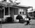 Side profile of a milkman delivering milk Poster Print (18 x 24)