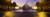 Posterazzi lit up at night with ghosted image of three men Louvre Museum Paris France Poster Print, (36 x 12)
