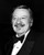 John Wayne wearing a bow tie Photo Print (8 x 10)