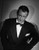 John Wayne in a bowtie Photo Print (8 x 10)