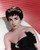 Posterazzi DAP17686 Elizabeth Taylor   Black Top with Red Background Photo Print 8 x 10 Multi