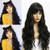 ANDRIA Black Loose Curly Wigs with Bangs Long Wigs for Women Synthetic Natural Wavy Wig Heat Resistant Fiber Black Color Hair loose Wave Wigs for Black Women
