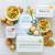 Housewarming Package: Two bowls of chicken noodle soup surrounded by rolls and cookies. Ladle and insert in image Insert reads: Home Sweet Home Housewarming Package: Two bowls of chicken noodle soup surrounded by rolls and cookies. Ladle and insert in image Insert reads: Home Sweet Home