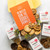 Two dozen cookie You’re Doing Great package with insert with text "No Matter How the Cookie Crumbles, keep it up. You're doing great!"