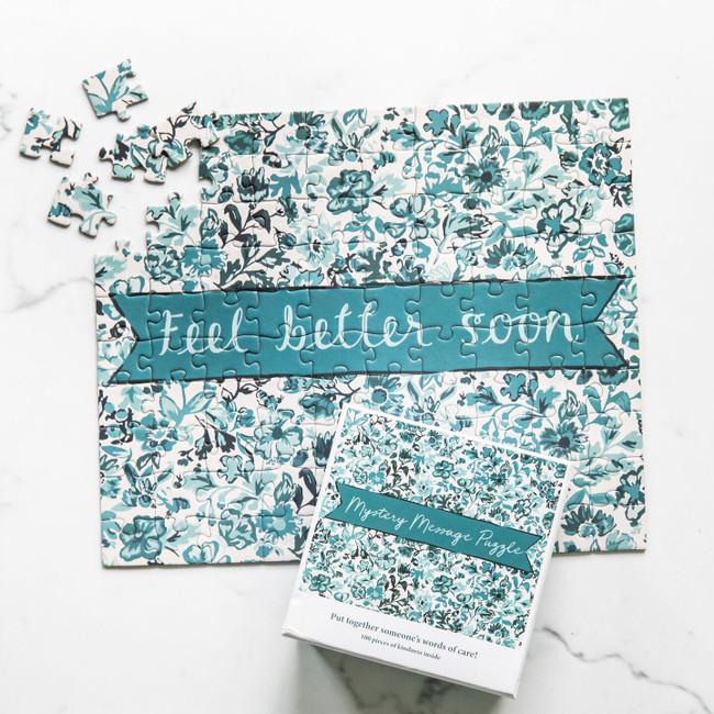 Mystery Message puzzle with blue floral design that reads "Feel better soon" when assembled