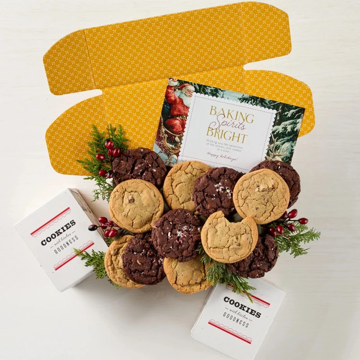 Festive Holiday Cookie Package with a decorative insert, and surrounded by cookie boxes.