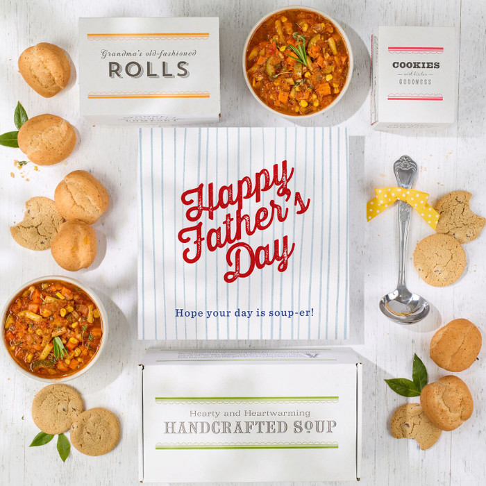 Overhead image of a Father’s Day promotional card beside packaged soup, bread rolls, and baked treats.