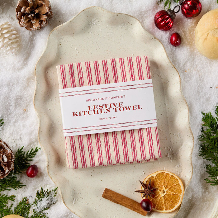 Festive Kitchen Towel on a decorative background.