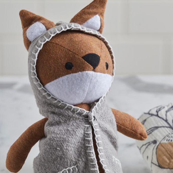 Stuffed toy Fox wearing a gray hoodie
