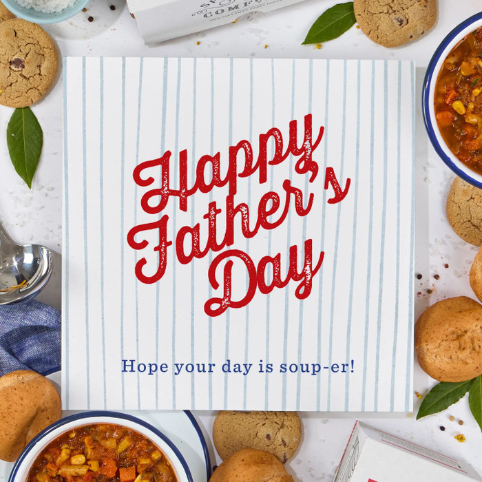 Overhead image of a Father’s Day promotional card beside packaged soup, bread rolls, and baked treats.