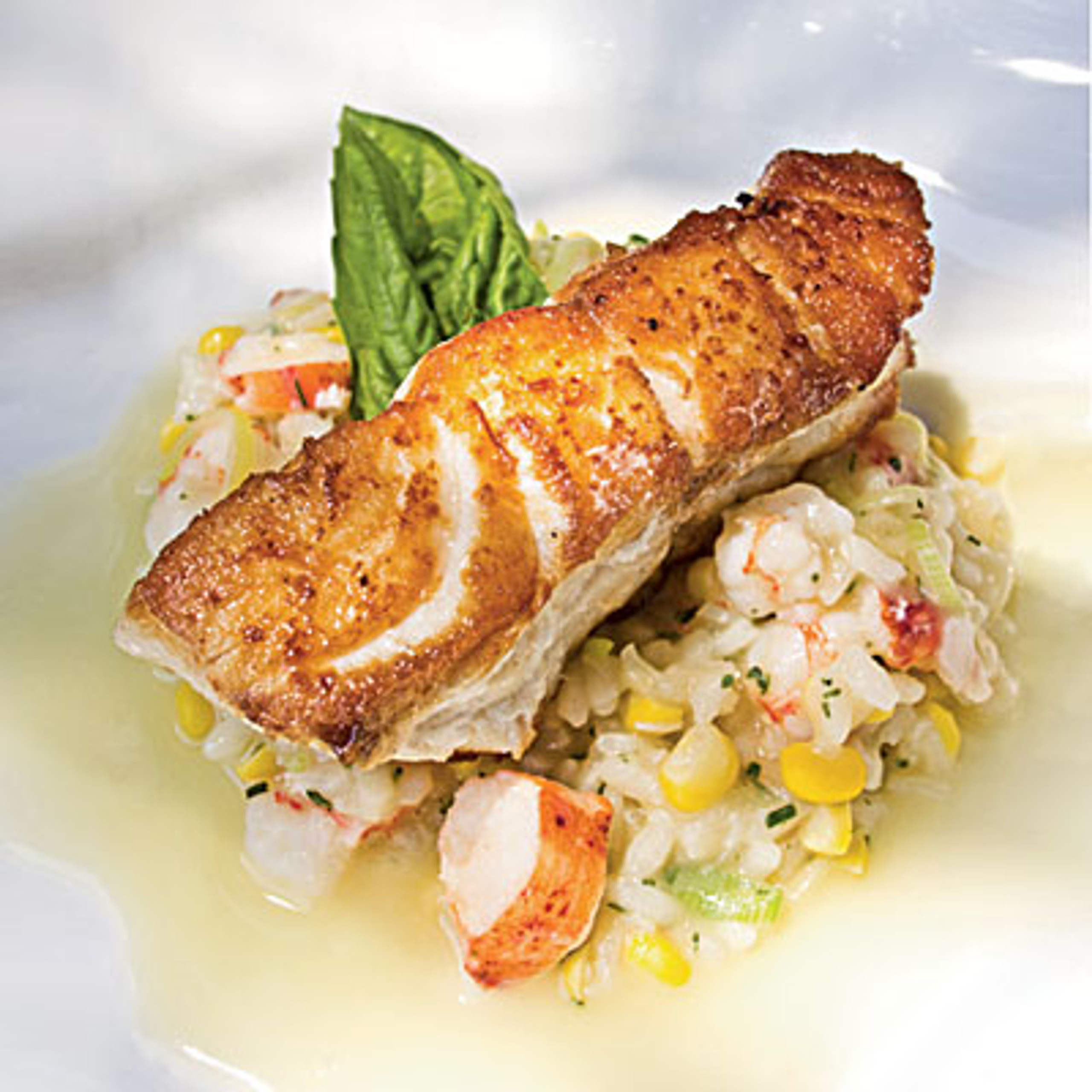 Roasted Grouper with Seafood Risotto and Champagne Citrus Beurre Blanc