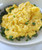 Scrambled Eggs over Creamy Polenta with Peppers & Creole Jambalaya Sauce