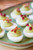 Avocado Deviled Eggs with Bacon and Pomegranate - (Free Recipe below)