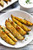 BAKED GARLIC PARMESAN POTATO WEDGES - (Free Recipe below)