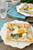 BAKED GREEN EGGS WITH PROSCIUTTO AND PESTO