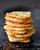 Parmesan, Oregano and Pine Nut Melts