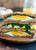 EGG, GREENS AND GOAT CHEESE BREAKFAST SANDWICH