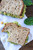 SMASHED CHICKPEA, AVOCADO AND PESTO SALAD SANDWICH