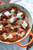 Cheesy Stuffed Meatballs over Spaghetti