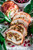 PROSCIUTTO WRAPPED TURKEY ROULADE WITH POMEGRANATE-PORT REDUCTION SAUCE