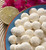 6 Tropical Popcorn flavors packaged in a decorative tin - Dockside Market