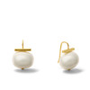 The OG. Designed by Catherine Canino in 2009, our statement large pebble pearl earring measuring 18 X 16mm, in white, signature handmade ear wire with secure hypoallergenic rubber back, overall length 1”, polished 14 karat gold over brass