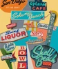 Greetings From The Coast 2 by Laurie Raskin, a 48 x 39.5-inch mixed-media artwork, layers colorful vintage motel, diner, beach, and roadside signs inspired by San Diego and the Southern California coast.