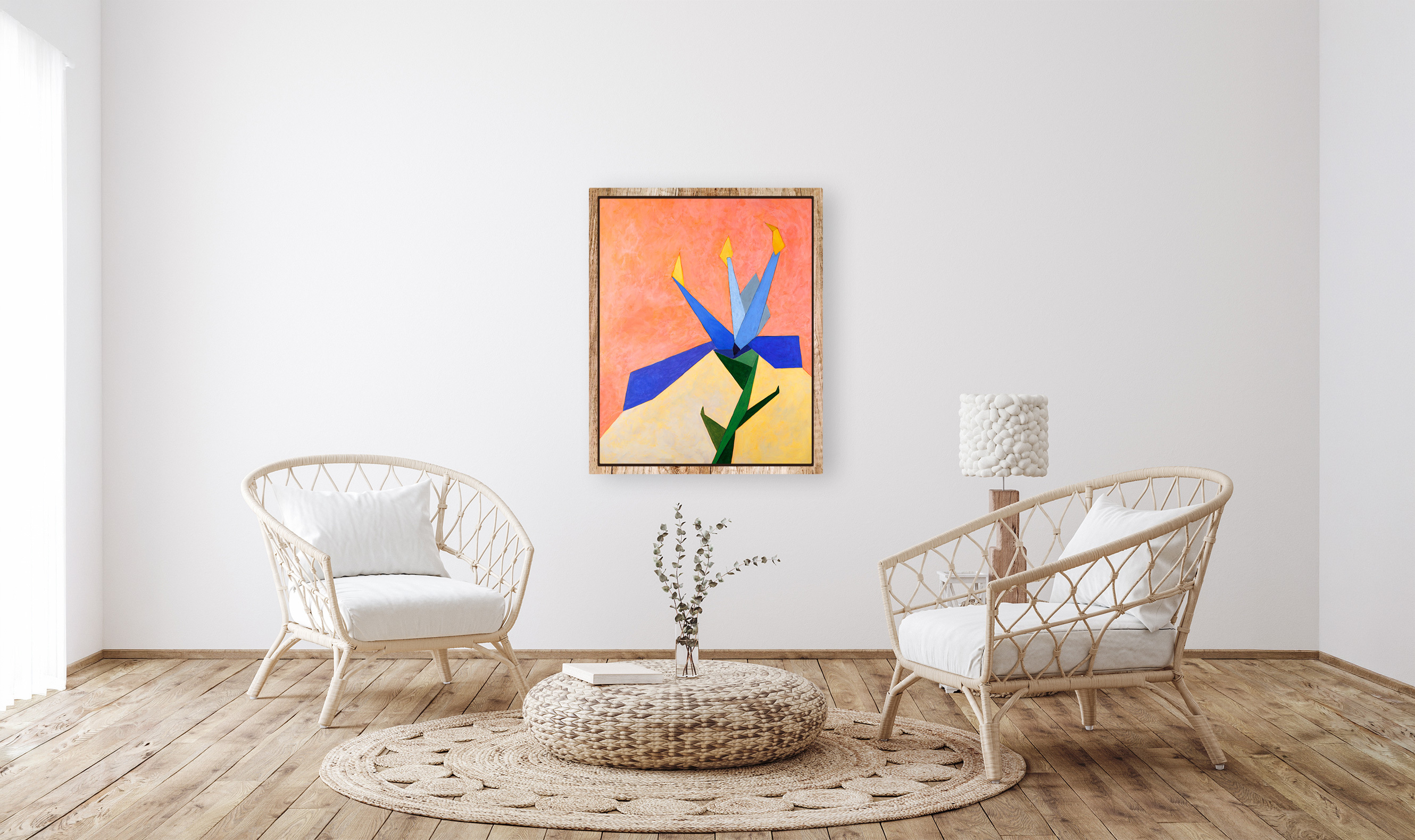 Geometric abstract art in a living room with two wooden chairs and round ottoman table.