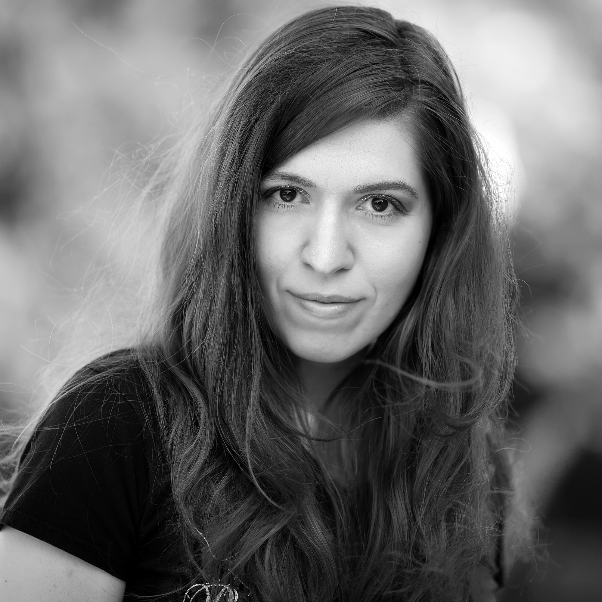 Black and white portrait of abstract artist Oksana Ossipov