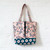 Time Warp Tote Bag made using Wild Strawbs Teal from the Tiny and Wild quilting fabric collection designed by Sue Gibbins for Cloud9 Fabrics. 100% organic cotton quilting fabric, ideal for quilting, patchwork and dressmaking TW-227160