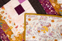 Quilt made using fabric from the Crafting Magic fabric collection designed by Maureen Cracknell for Art Gallery Fabrics. 100% OEKO-TEX Certified Standard Quilting and Patchwork Cotton Fabric