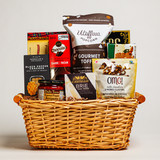 The Gourmet Delight Large is one of our best-selling gift baskets, filled with our favorite selection of traditional gourmet foods. It includes creamy Brie cheese, savoury antipasto, crisp crackers, delectable cookies, and a delightful mix of sweets. This generous assortment is perfect for sharing with friends, family, or clients on any occasion. Its elegant presentation makes it a thoughtful and impressive gift choice.
