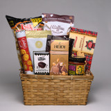 A wicker basket with everything needed to impress someone special in your life! This basket has it all - chips and salsa for the salty-snacker (La Cocina Tortilla Chips, Made in Manitoba), chocolate pretzel stacks (Made in Canada), Utoffea Chocolate Drizzled Popcorn (Made in Manitoba) and Heidi Chocolate Bar for the sweet tooth! One of our top selling products, Coffee Candy by Bali's Best, and so much more are all included in this bountiful basket! Order yours online today! 
