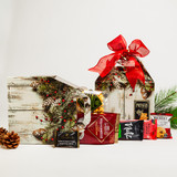 The perfect gift when "just a little something" is needed, this holiday gift box comes with a remarkable selection of small snacks & treats...so much so, that you may just want to add another to your order for yourself!  Contact our office by phone if you need a custom version of this design or a large number. These boxes are perfect for holding a gift card, too!