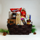 The holiday version of our top selling gift basket! It is generously sized and brimming with traditional favorites as well as many holiday staples like mint chocolate snowflakes, peanut brittle, and Scottish Three Berry Jam. Savour creamy Brie cheese, delicious vegetable antipasto, crisp crackers, delectable cookies, and a delightful mix of sweets. Perfect for sharing with friends, family, or clients, this gift basket is an ideal choice for any occasion. Its elegant presentation ensures it makes a lasting impression. Order online today before they are sold out! 
