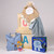 Celebrate a new arrival with this charming gift, complete with ABC wooden boxes in two sizes, thoughtfully curated to delight both baby and parents. Order online today to share in the joy of this special occasion.