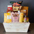 This large reusable wooden container is loaded with everyone's favourite snacks and treats! Locally Made in Manitoba tortilla chips by La Cocina are paired with salsa, chocolate, peanut butter truffles, cookies and so much more. This wonderful gift basket will make all who receive it feel special and pampered. Order online today! 