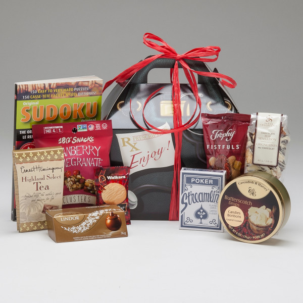 When just a little gift is needed, this one is perfect! With a lovely selection of snacks & treats, plus a deck of cards & Sudoku Puzzle, this little box of goodies is sure to brighten their day!