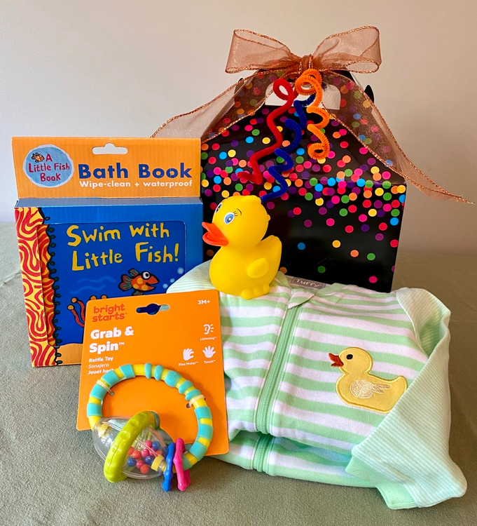 This Little Box for Baby- Bath Time is the perfect gift when you need something small but thoughtfully put together. This gift can be customized to make it suitable for BOY, GIRL, or gender neutral, and it includes toys, bath book and sleeper.